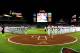 ATLANTA, GA - OCTOBER 03: The Atlanta Braves and the Los Angeles Dodgers line up for the national anthem before Game One of the National League Division Series at Turner Field on October 3, 2013 in Atlanta, Georgia. (Photo by Scott Cunningham/Getty Images)