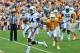 Nov 9, 2013; Knoxville, TN, USA; Auburn Tigers quarterback Nick Marshall (14) rushes for the end zone against Tennessee Volunteers defensive back Byron Moore (3) during the first half at Neyland Stadium. Mandatory Credit: Jim Brown-USA TODAY Sports