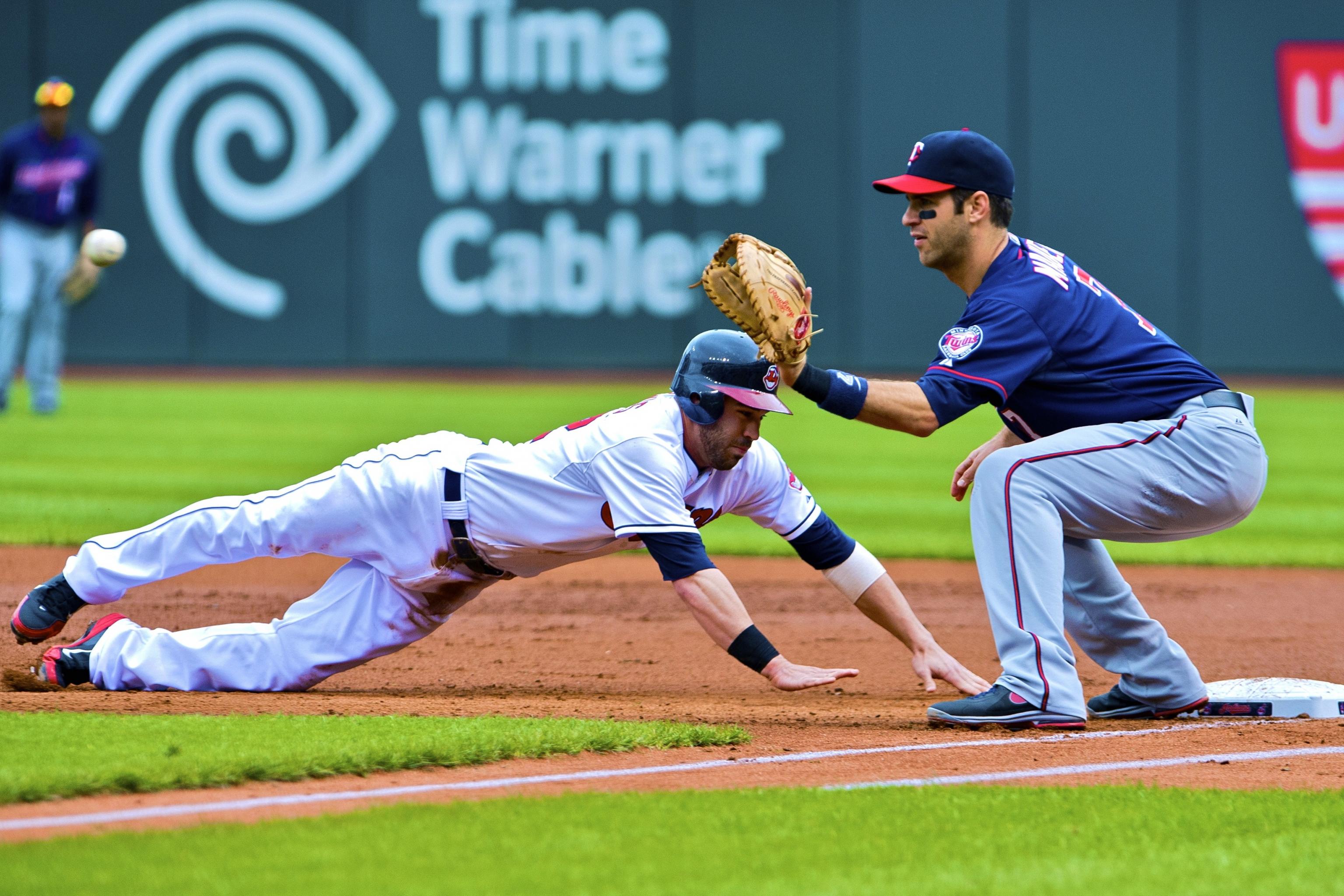Will Joe Mauer's Offensive Ceiling at First Base Justify His