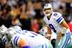 NEW ORLEANS, LA - NOVEMBER 10: Tony Romo #9 of the Dallas Cowboys calls a play at the line of scrimmage during a game against the New Orleans Saints at the Mercedes-Benz Superdome on November 10, 2013 in New Orleans, Louisiana. New Orleans won the game 49-17. (Photo by Stacy Revere/Getty Images)