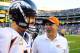Nov 10, 2013; San Diego, CA, USA; Denver Broncos quarterback Peyton Manning (18) celebrates with Denver Broncos interim head coach Jack Del Rio following a win against the San Diego Chargers at Qualcomm Stadium. The Broncos won 28-20. Mandatory Credit: Christopher Hanewinckel-USA TODAY Sports