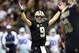 NEW ORLEANS, LA - NOVEMBER 10: Quarterback Drew Brees #9 of the New Orleans Saints celebrates against the Dallas Cowboys during a game at the Mercedes-Benz Superdome on November 10, 2013 in New Orleans, Louisiana. (Photo by Ronald Martinez/Getty Images)