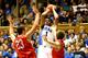 DURHAM, NC - NOVEMBER 08: Jabari Parker #1 of the Duke Blue Devils shoots over Tom Droney #23 of the Davidson Wildcats during their game at Cameron Indoor Stadium on November 8, 2013 in Durham, North Carolina. (Photo by Streeter Lecka/Getty Images)