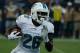 HOUSTON, TX - AUGUST 17: Lamar Miller #26 of the Miami Dolphins runs for a 4-yard touchdown in the first half against the Houston Texans during a preseaon game at Reliant Stadium on August 17, 2013 in Houston, Texas. (Photo by Scott Halleran/Getty Images)