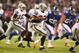 EAST RUTHERFORD, NJ - NOVEMBER 10: Taiwan Jones #22 of the Oakland Raiders runs against the New York Giants during their game at MetLife Stadium on November 10, 2013 in East Rutherford, New Jersey. (Photo by Al Bello/Getty Images)
