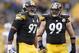 Nov 10, 2013; Pittsburgh, PA, USA; Pittsburgh Steelers defensive end Cameron Heyward (97) and defensive end Brett Keisel (99) react after Heyward registered a sack against the Buffalo Bills during the fourth quarter at Heinz Field. The Pittsburgh Steelers won 23-10. Mandatory Credit: Charles LeClaire-USA TODAY Sports