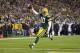 Nov 14, 2011; Green Bay, WI, USA; Green Bay Packers quarterback Matt Flynn (10) rushes for a touchdown during the fourth quarter against the Minnesota Vikings at Lambeau Field. The Packers defeated the Vikings 45-7. Mandatory Credit: Jeff Hanisch-USA TODAY Sports
