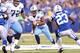 INDIANAPOLIS, IN - DECEMBER 09: Chris Johnson #28 of the the Tennessee Titans runs with the ball during the NFL game against the Indianapolis Colts at Lucas Oil Stadium on December 9, 2012 in Indianapolis, Indiana. (Photo by Andy Lyons/Getty Images)