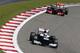 Pastor Maldonado leads Sergio Perez at the 2013 German Grand Prix.