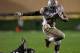 EVANSTON, IL - OCTOBER 05: Carlos Hyde #34 of the Ohio State Buckeyes runs over Matthew Harris #27 of the Northwestern Wildcats at Ryan Field on October 5, 2013 in Evanston, Illinois. Ohio State defeated Northwestern 40-30. (Photo by Jonathan Daniel/Getty Images)