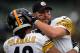 OAKLAND, CA - OCTOBER 27: Ben Roethlisberger #7 and Troy Polamalu #43 of the Pittsburgh Steelers greets each other during pre-game warm ups prior to playing the Oakland Raiders at O.co Coliseum on October 27, 2013 in Oakland, California. (Photo by Thearon W. Henderson/Getty Images)