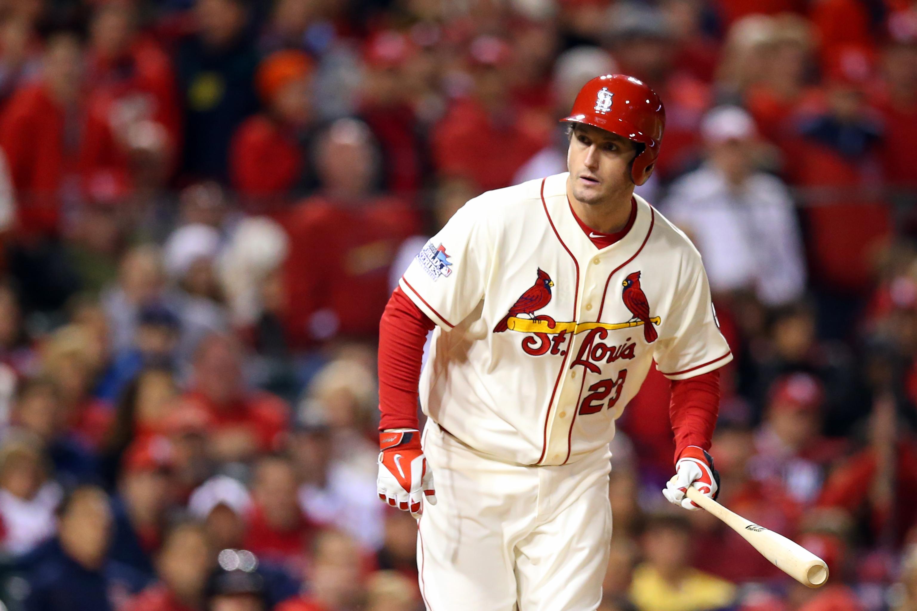 St. Louis Cardinals third baseman David Freese slides into third