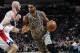 SAN ANTONIO, TX - NOVEMBER 13: Tim Duncan #21 of the San Antonio Spurs dribbles to the basket against the Washington Wizards on November 13, 2013 at the AT&T Center in San Antonio, Texas. NOTE TO USER: User expressly acknowledges and agrees that, by downloading and/or using this photograph, user is consenting to the terms and conditions of the Getty Images License Agreement. Mandatory Copyright Notice: Copyright 2013 NBAE (Photo by Chris Covatta/NBAE via Getty Images)