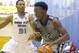 Jul 13, 2013; North Augusta, SC, USA; Oakland Soldiers player Stanley Johnson (32) drives toward the basket while being defended by Howard Pulley Panthers player James Lawson (31) at the Riverview Park Activities Center during the Nike Peach Jam. Mandatory Credit: Joshua S. Kelly-USA TODAY Sports