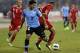 AMMAN, JORDAN- NOVEMBER 13: Luis Suarez of Uruguay and Oday Zahran of Jordan compete for the ball during the FIFA 2014 World Cup Qualifier: Intercontinental Play-off First Leg between Jordan and Uruguay on November 13, 2013 in Amman, Jordan. (Photo by Salah Malkawi/ Getty Images)