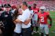 COLUMBUS, OH - SEPTEMBER 7: Head Coach Urban Meyer of the Ohio State Buckeyes hugs his daughter Nicole Meyer after the Buckeyes defeated the San Diego State Aztecs 42-7 at Ohio Stadium on September 7, 2013 in Columbus, Ohio. (Photo by Jamie Sabau/Getty Images)