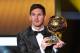 ZURICH, SWITZERLAND - JANUARY 07: Lionel Messi of Argentina holds the trophy after winning the FIFA Ballon d'Or for a fourth consecutive time during the FIFA Ballon d'Or Gala 2013 at Congress House on January 7, 2013 in Zurich, Switzerland. (Photo by Harold Cunningham/Getty Images)