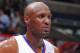 LOS ANGELES, CA - APRIL 16: Lamar Odom #7 of the Los Angeles Clippers stands on the court in the game against the Portland Trail Blazers at Staples Center on April 16, 2013 in Los Angeles, California. NOTE TO USER: User expressly acknowledges and agrees that, by downloading and/or using this Photograph, user is consenting to the terms and conditions of the Getty Images License Agreement. Mandatory Copyright Notice: Copyright 2013 NBAE (Photo by Andrew D. Bernstein/NBAE via Getty Images)