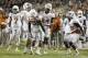 Oct 26, 2013; Fort Worth, TX, USA; Texas Longhorns running back Malcolm Brown (28) celebrates scoring a touchdown with running back Joe Bergeron (24) and running back Johnathan Gray (32) during the game against the TCU Horned Frogs at Amon G. Carter Stadium. Mandatory Credit: Tim Heitman-USA TODAY Sports