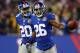 EAST RUTHERFORD, NJ - DECEMBER 09: Antrel Rolle #26 of the New York Giants celebrates after he recovered a New Orleans Saints fumble with teamamte Prince Amukamara #20 on December 9, 2012 at MetLife Stadium in East Rutherford, New Jersey. (Photo by Elsa/Getty Images)