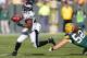 GREEN BAY, WI - NOVEMBER 10: LeSean McCoy #25 of the Philadelphia Eagles gets around Clay Matthews #52 of the Green Bay Packers during a first quarter run at Lambeau Field on November 10, 2013 in Green Bay, Wisconsin. (Photo by Gregory Shamus/Getty Images)