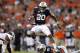 Sep 14, 2013; Auburn, AL, USA; Auburn Tigers running back Corey Grant (20) leaps over fullback Jay Prosch (35) during the first half against the Mississippi State Bulldogs at Jordan Hare Stadium. Mandatory Credit: John Reed-USA TODAY Sports