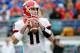 JACKSONVILLE, FL - NOVEMBER 02: Aaron Murray #11 of the Georgia Bulldogs attempts a pass during the game against the Florida Gators at EverBank Field on November 2, 2013 in Jacksonville, Florida. (Photo by Sam Greenwood/Getty Images)