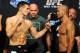 Nov 15, 2013; Las Vegas, NV, USA; UFC fighters Rory MacDonald (left) and Robbie Lawler pose for photographs during the weigh-in of UFC 167 at MGM Grand Garden Arena. Mandatory Credit: Stephen R. Sylvanie-USA TODAY Sports