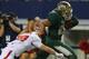 ARLINGTON, TX - NOVEMBER 16: Devin Chafin #28 of the Baylor Bears runs for a touchdown against Tanner Jacobson #20 of the Texas Tech Red Raiders at AT&T Stadium on November 16, 2013 in Arlington, Texas. (Photo by Ronald Martinez/Getty Images)