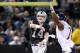 OAKLAND, CA - AUGUST 23: Matt McGloin #14 of the Oakland Raiders passes the ball over the out stretched arm of Cornelius Washington #78 of the Chicago Bears in the fourth quarter at O.co Coliseum on August 23, 2013 in Oakland, California. (Photo by Thearon W. Henderson/Getty Images)
