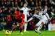 CARDIFF, WALES - NOVEMBER 03: Fraizer Campbell of Cardiff City evades Jonathan de Guzman of Swansea City during the Barclays Premier League match between Cardiff City and Swansea City at Cardiff City Stadium on November 3, 2013 in Cardiff, Wales. (Photo by Laurence Griffiths/Getty Images)