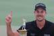 DUBAI, UNITED ARAB EMIRATES - NOVEMBER 17: Henrik Stenson of Sweden poses with the Race To Dubai trophy and the DP World Tour Championship trophy after winning the DP World Tour Championship on the Earth Course at Jumeirah Golf Estates on November 17, 2013 in Dubai, United Arab Emirates (Photo by Francois Nel/Getty Images)