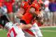 CHAMPAIGN, IL - NOVEMBER 16: Joey Bosa #97 of the Ohio State Buckeyes sacks Nathan Scheelhaase #2 of the Illinois Fighting Illini at Memorial Stadium on November 16, 2013 in Champaign, Illinois. (Photo by Jonathan Daniel/Getty Images)