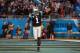 Nov 18, 2013; Charlotte, NC, USA; Carolina Panthers quarterback Cam Newton (1) celebrates after throwing a touchdown pass during the fourth quarter against the New England Patriots at Bank of America Stadium. The Panthers defeated the Patriots 24-20. Mandatory Credit: Jeremy Brevard-USA TODAY Sports