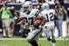 Nov 17, 2013; Houston, TX, USA; Oakland Raiders running back Rashad Jennings (27) runs the ball for a touchdown during the third quarter against the Houston Texans at Reliant Stadium. The Raiders defeated the Texans 28-23. Mandatory Credit: Troy Taormina-USA TODAY Sports