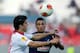 SEVILLE, SPAIN - OCTOBER 03: Diego Perotti (L) of Sevilla FC runs for the ball against Francis Coquelin (R) of SC Freiburg during the UEFA Europa League group H match between Sevilla FC and SC Freiburg at Estadio Ramon Sanchez Pizjuan on October 3, 2013 in Seville, Spain. (Photo by Gonzalo Arroyo Moreno/Getty Images)