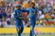 LONDON, ENGLAND - JUNE 17: Lasith Malinga of Sri Lanka is congratulated by team mate Rangana Herath after bowling Glenn Maxwell of Australia during the ICC Champions Trophy Group A fixture between Sri Lanka and Australia at The Kia Oval on June 17, 2013 in London, England. (Photo by Mike Hewitt/Getty Images)