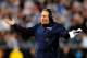 Patriots coach Bill Belichick (above) carries out a gesture most Patriot fans make when each important defensive player goes down with an injury.
