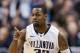 Mar 06, 2013; Philadelphia, PA, USA; Villanova Wildcats guard James Bell (32) celebrates making a basket during the first half against the Georgetown Hoyas at the Wells Fargo Center. Villanova defeated Georgetown 67-57. Mandatory Credit: Howard Smith-USA TODAY Sports