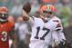 CINCINNATI, OH - NOVEMBER 17: Jason Campbell #17 of the Cleveland Browns passes the football under heavy pressure during the game against the Cincinnati Bengals at Paul Brown Stadium on November 17, 2013 in Cincinnati, Ohio. The Bengals defeated the Browns 41-20. (Photo by John Grieshop/Getty Images)