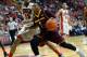 LAS VEGAS, NV - NOVEMBER 19: Jahii Carson #1 of the Arizona State Sun Devils drives against Bryce Dejean-Jones #13 of the UNLV Rebels during their game at the Thomas & Mack Center on November 19, 2013 in Las Vegas, Nevada. Carson had 40 points to lead Arizona State to an 86-80 win. (Photo by Ethan Miller/Getty Images)