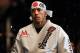 Nov 16, 2013; Las Vegas, NV, USA; Georges St-Pierre (red gloves) enters the cage before his welterweight championship bout during UFC 167 at MGM Grand Garden Arena. Mandatory Credit: Stephen R. Sylvanie-USA TODAY Sports