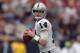 Nov 17, 2013; Houston, TX, USA; Oakland Raiders quarterback Matt McGloin (14) throws a pass against the Houston Texans at Reliant Stadium. The Raiders defeated the Texans 28-23. Mandatory Credit: Kirby Lee-USA TODAY Sports
