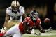 NEW ORLEANS, LA - SEPTEMBER 08: Harry Douglas #83 of the Atlanta Falcons makes a catch over Kenny Vaccaro #32 of the New Orleans Saints at the Mercedes-Benz Superdome on September 8, 2013 in New Orleans, Louisiana. (Photo by Chris Graythen/Getty Images)