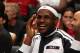 MIAMI, FL - NOVEMBER 12: LeBron James #6 of the Miami Heat smiles during the game against the Milwaukee Bucks on November 12, 2013 at American Airlines Arena in Miami, Florida. NOTE TO USER: User expressly acknowledges and agrees that, by downloading and/or using this photograph, user is consenting to the terms and conditions of the Getty Images License Agreement. Mandatory copyright notice: Copyright NBAE 2013 (Photo by Issac Baldizon/NBAE via Getty Images)
