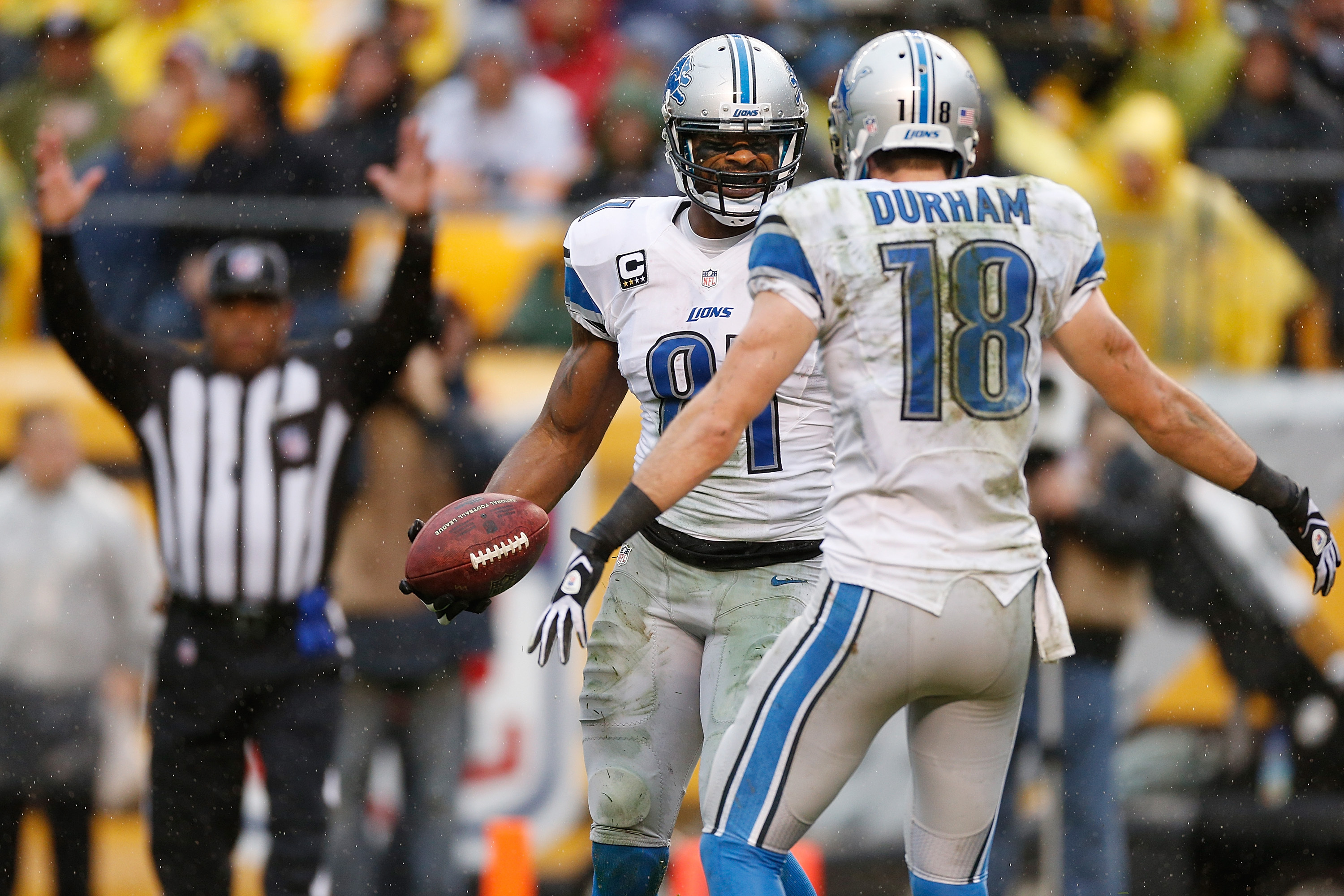 Matthew Stafford and Calvin Johnson of the Detroit Lions celebrate