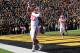 Nov 2, 2013; Iowa City, IA, USA; Wisconsin Badgers running back James White (20) celebrates in the endzone after scoring a touchdown against the Iowa Hawkeyes at Kinnick Stadium. Wisconsin beat Iowa 28-9. Mandatory Credit: Reese Strickland-USA TODAY Sports