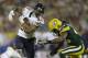 GREEN BAY, WI - NOVEMBER 04: Matt Forte #22 of the Chicago Bears runs with the football before getting tackled by M.D. Jennings #43 of the Green Bay Packers during the second half of play at Lambeau Field on November 04, 2013 in Green Bay, Wisconsin. (Photo by Mike McGinnis/Getty Images)