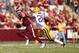 LSU cornerback Jalen Mills chases after Texas A&M quarterback Johnny Manziel. Mills is tied for the team lead in sacks with three on the season.