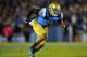 October 12, 2013; Pasadena, CA, USA; UCLA Bruins linebacker Anthony Barr (11) defends against the California Golden Bears during the first half at the Rose Bowl. Mandatory Credit: Gary A. Vasquez-USA TODAY Sports